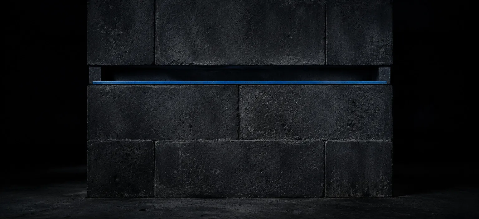 A structural wall with its lower and upper courses complete and one continuous empty course between them